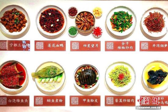 图为中国赣菜品牌推广中心内展示的赣菜“十大名菜”。(资料图) 吴鹏泉 摄 图为中国赣菜品牌推广中心内展示的赣菜“十大名菜”。(资料图) 吴鹏泉 摄