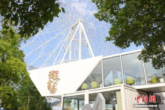 ͼΪ����ʡ�ϲ��к��̲�������鷿Ħ���ַֹݣ��Ա߾��ǡ��ϲ�֮�ǡ�Ħ���֣��÷ֹݽ�������Ϊ���������¶̨�ļ�װ��ʽ�ṹ����۶��ء����ܽ��� ��